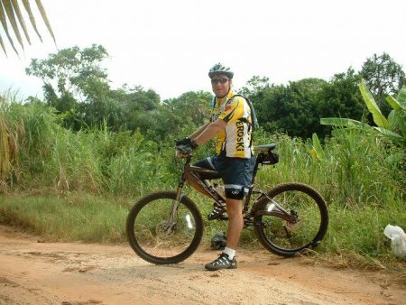 Aaron rides his Fuji in Gabon