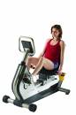 Woman riding the G-Force RT recumbent exercise bike